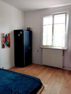 Appartements Maison avec jardin au calme : photos des chambres