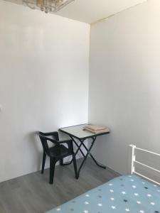 Appartements micro-salle en face de la Gare : photos des chambres