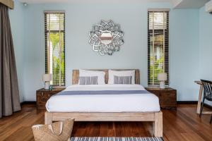 Tropical 3BR Holiday Villa with Pool, BBQ, and Shaded Patio within Walking Distance to Bang Tao Beach