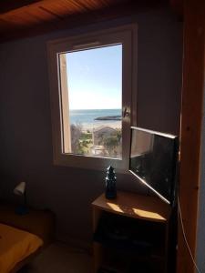 Appartements Appartement atypique, vue sur la mer : photos des chambres