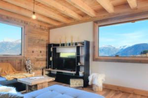 Appartements Chalet vue Mont Blanc avec jacuzzi exterieur : photos des chambres