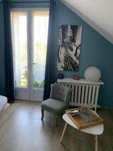 Sejours chez l'habitant Chambre cosy a Houilles : photos des chambres