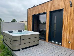 Chalets Le Laponya - Chalet avec SPA - Parking 7KW : photos des chambres