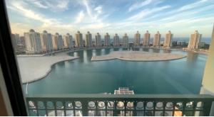 Beachfront Luxury Apartment-Pearl Island شقه مطله على الشاطئ بجزيرة اللؤلؤه