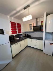 Appartements Home DisneyLand Paris avec Parking wifi : photos des chambres