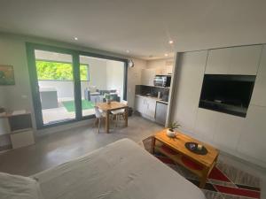 Appartements Appartement avec Terrasse couverte - La Motte-Servolex : photos des chambres