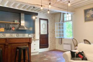 Appartements Le Vieux Bistrot au Coeur de L'isle sur la Sorgue : photos des chambres
