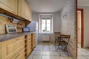 Appartements Le Fournil : photos des chambres