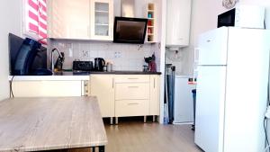 Appartements Home DisneyLand Paris avec Parking wifi : photos des chambres