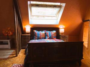 B&B / Chambres d'hotes Chambres d'hotes de charme entre Bayeux et les plages du debarquement : photos des chambres