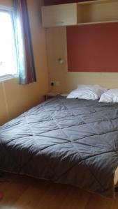 Campings magnifique mobil home avec clim face mer : photos des chambres