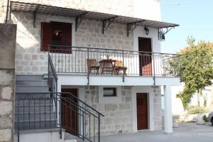 Apartment in stone house on seaside