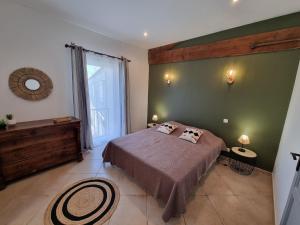 Maisons de vacances Authentique Mas provencal entre mer et Camargue : photos des chambres