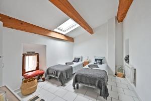 Maisons de vacances Gite le Leoannatim - Maison de caractere pour 6 : photos des chambres