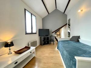 Appartements Suites Rive Gauche - Nemours Centre - Chez Ingrid : photos des chambres