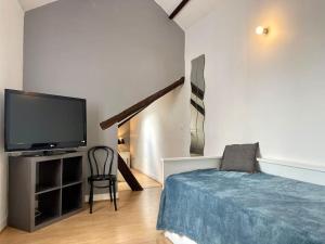 Appartements Suites Rive Gauche - Nemours Centre - Chez Ingrid : photos des chambres