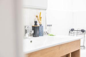Appartements Le Cosy WIFI CLIM JARDIN TOP PROS SERVICESConciergerie MONTPELLIER : photos des chambres