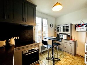 Appartements Suites Rive Gauche - Duplex Fontainebleau - Chez Andre : photos des chambres