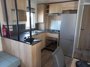 Campings Mobil home - Clim, LV, LL - Camping Les Sables du Midi '4 etoiles' - 004 : photos des chambres