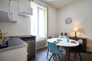 Appartements Le Nordic - T2 suite parentale - 5 mins des Caves de Champagne : photos des chambres