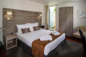 Hotels Hotel LA MARGELLE : photos des chambres