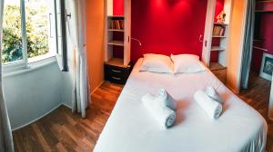 Appartements Le serenite - T3 en maison de ville avec piscine : photos des chambres