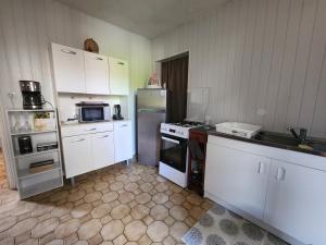 Maisons de vacances Maison de campagne dans le vignoble champenois : photos des chambres