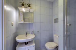 Tradycyjny i Przytulny Apartament Sun Seasons 24 w Kołobrzegu by Noclegi Renters