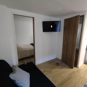 Appartements A 10 min de Rouen - Le Rollon : photos des chambres