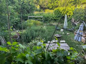 Sejours chez l'habitant Maison au bord de l’eau : photos des chambres