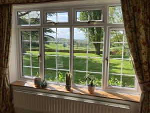 Exclusive 2 Bedroom Apartment with Summer House and Hot Tub