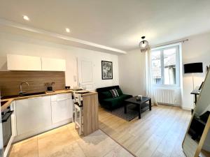 Appartements Suite ~ Romance Estivale ~ a 15 min de Lyon : photos des chambres