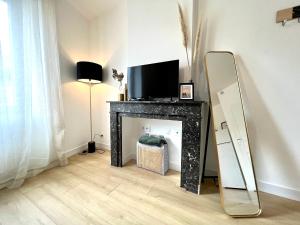 Appartements Suite ~ Romance Estivale ~ a 15 min de Lyon : photos des chambres