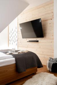 Dwupoziomowy apartament Przy lesie II z prywatnym jacuzzi w Kościelisku