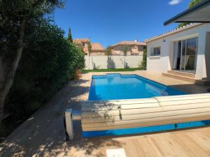 Villas VILLA FLAVIE- Luxueuse - Confort Jardin Barcecue Borne Recharge Electrique 10min PLAGE- FAMILLE-PISCINE-TOP PROS SERVICES Conciergerie : photos des chambres