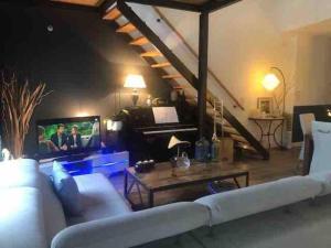 Maisons de vacances Maison Loft Cosy a 8 mn et du port de La Rochelle : photos des chambres