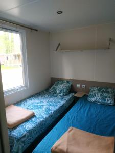 Appartements Mobilome 6 personnes climatise : photos des chambres