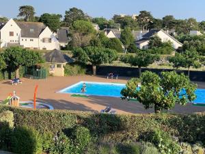 Appartements Duplex confortable, piscine, proche plage/Jumping : photos des chambres