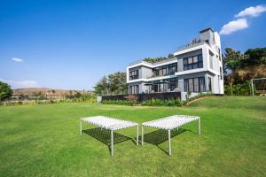 Casa Boho by StayVista - Contemporary design, Farm-view, Swimming pool & Indoor games for a chic retreat