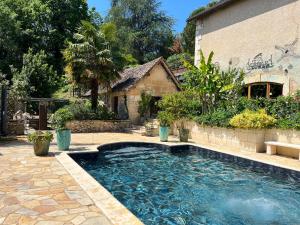 Maisons de vacances Maison de 4 chambres avec piscine partagee jacuzzi et jardin amenage a Saint Front de Pradoux : photos des chambres