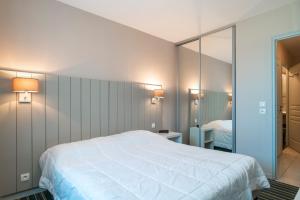 Appartements Les Thermes 404 - Appt proche plage avec piscine partagee : photos des chambres