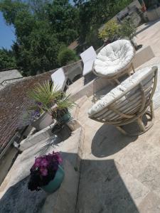 Appartements Les petunias : photos des chambres