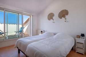 Appartements Face Mer, appartement Le Soleil Couchant pour 4 : photos des chambres