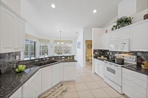 Inviting, quiet home in with pool and steps to beach