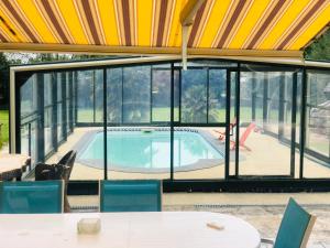 Maisons de vacances Maison familiale avec piscine : photos des chambres