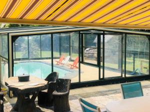 Maisons de vacances Maison familiale avec piscine : photos des chambres