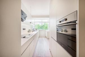 Silva Apartment by Olala Homes