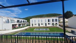 Appartements Les Papillos du Ventoux - Le Petit Sylvain - een slaapkamer met terras : photos des chambres