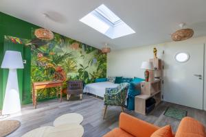 Appartements La Halte des Miquelots - Appt avec jardin : photos des chambres