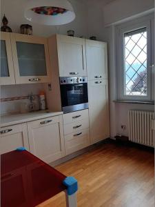 La finestra sul lago - in villa con vista e posto auto coperto